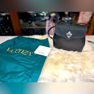 Vintage Vincenza Inc black leather/suede shoulder bag.